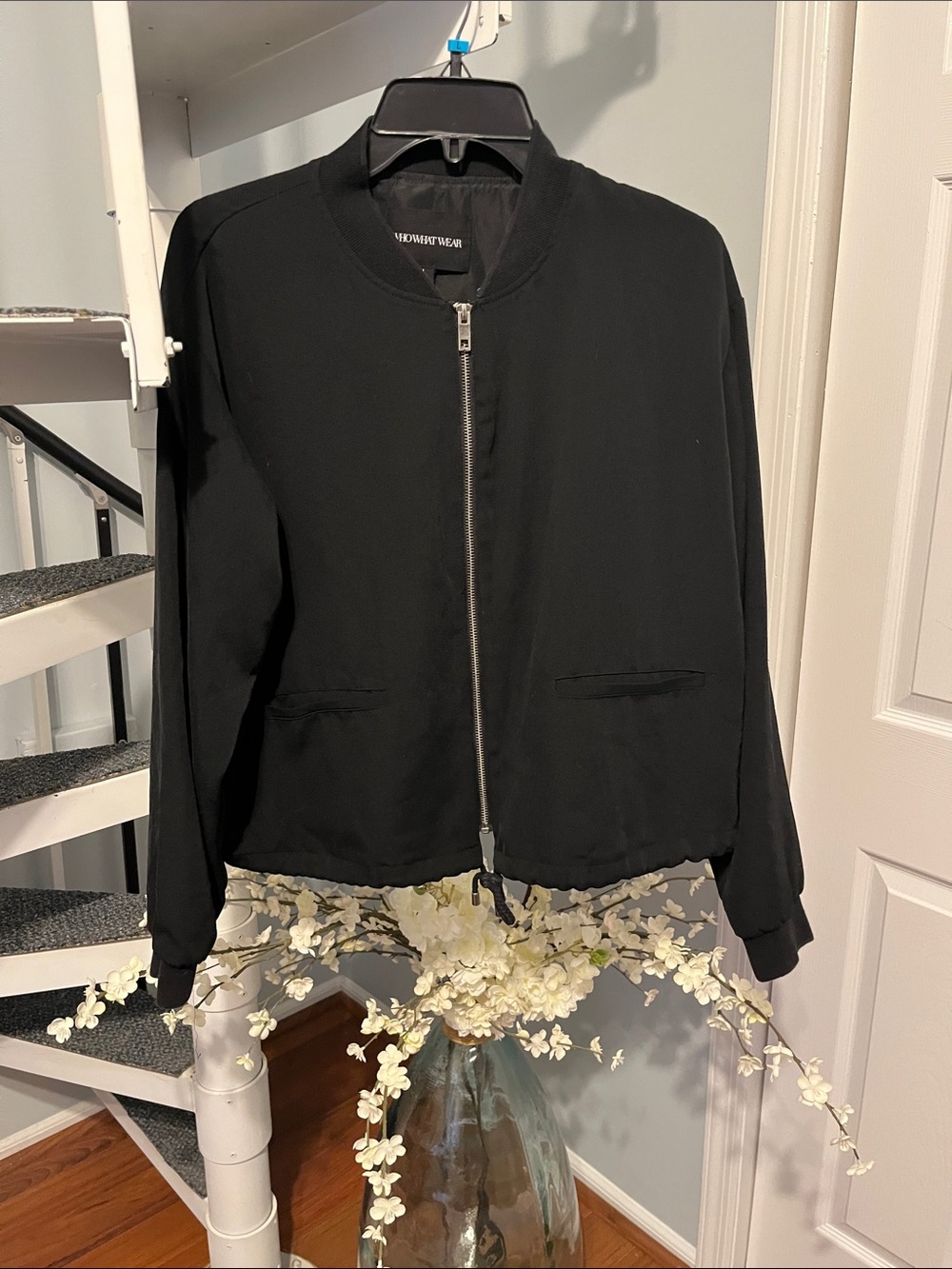 Black zip-up lightweight bomber style